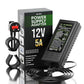12V 5A power supply adapter with packaging on a white background
